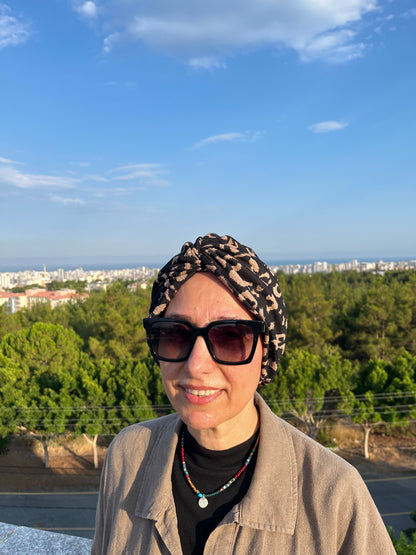 SİYAH - KREM DESENLİ BÜRÜMCÜK BURGULU BONE