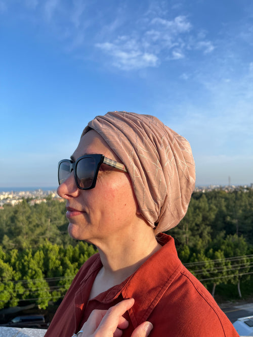 PUDRA KABARTMA DESENLİ SANDY BÜZGÜLÜ BONE